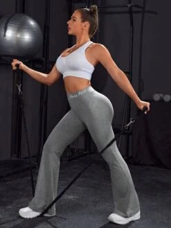 Letter Graphic Flare Leg Sports Pants -Sculptive Wear 16883656986f571fb6b3d4947886ff5fc818cb0cf6 thumbnail 405x552