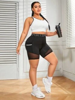 Plus Letter Graphic Mesh Insert Sports Shorts With Phone Pocket -Sculptive Wear 16887185279ce8db3dbfb3fbf19549e60cb369d7a6 thumbnail 405x552