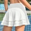 SHEIN Leisure Solid Tennis Sports Skort With Phone Pocket -Sculptive Wear 16889732304dbb1d940cb94f9a31dcc67f8513706b thumbnail 405x552